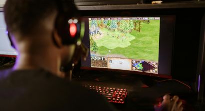 guy playing game in pc