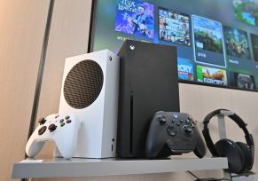 Microsoft's Xbox Series X (black) and series S (white)