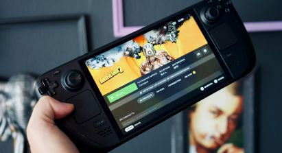 Person Holding Steam Deck OLED