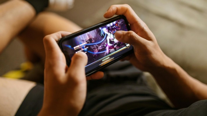 Person Playing a Mobile Video Game